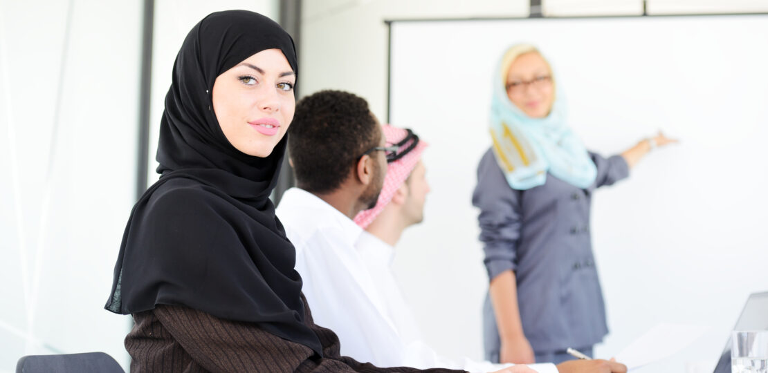 arabic-middle-eastern-woman-having-a-business-presentation-with-copy-space-board_SY-lZyeA4o